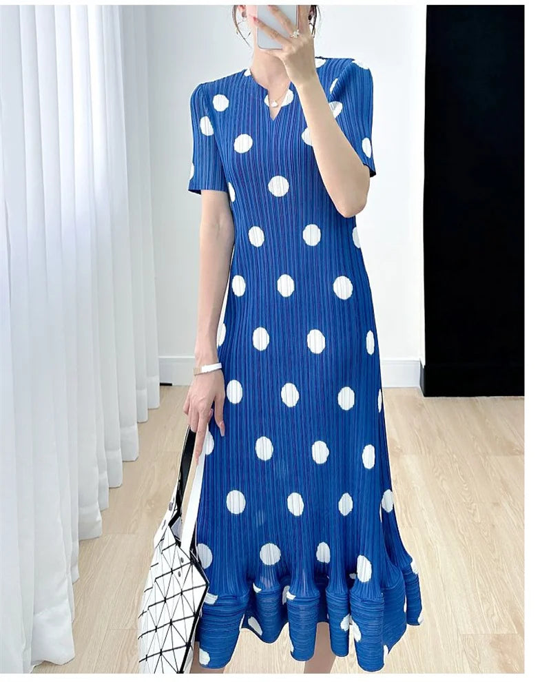Blue polka dot pleated dress